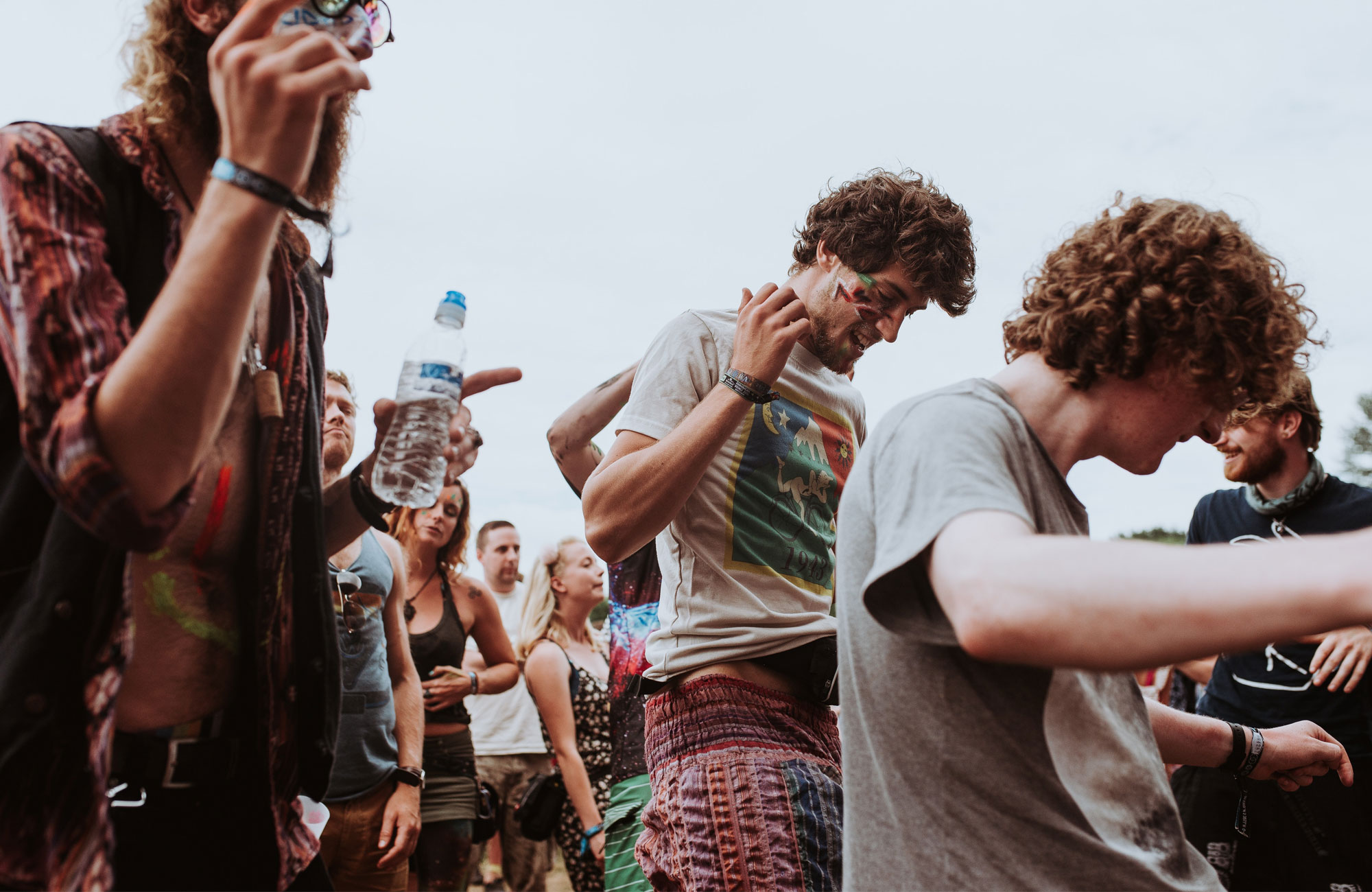 Group of travellers partying in colourful clothing