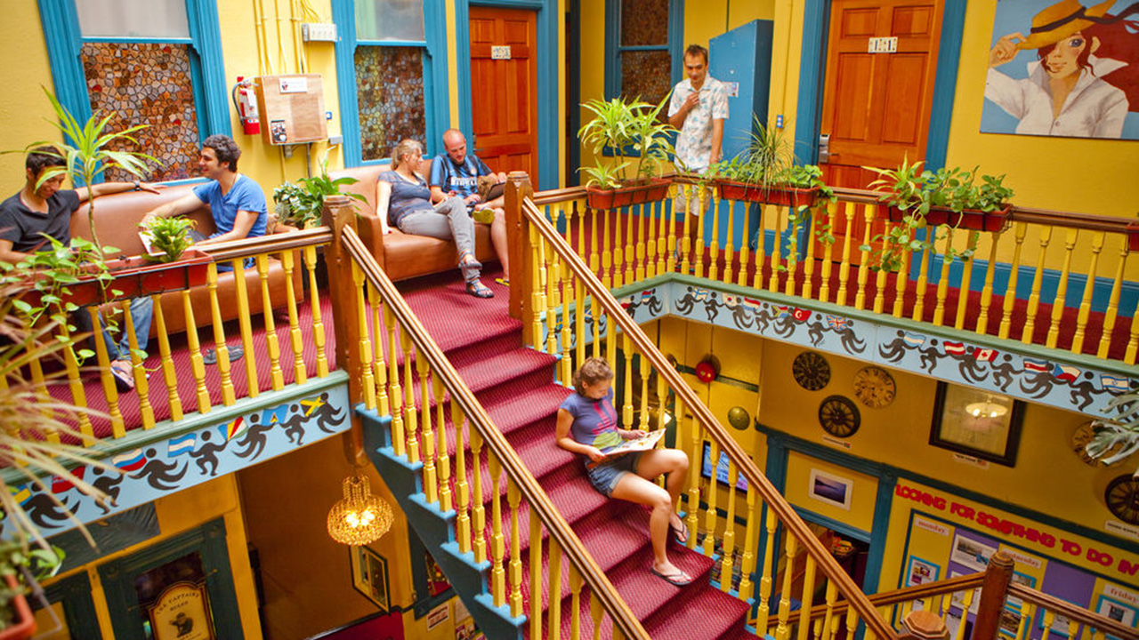 Image of a colourful staircase in a hostel in California - KILROY