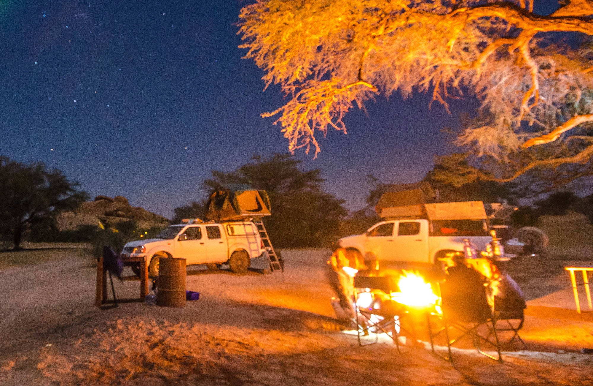 namibia-campervan-night-camp-bonfire-under-trees