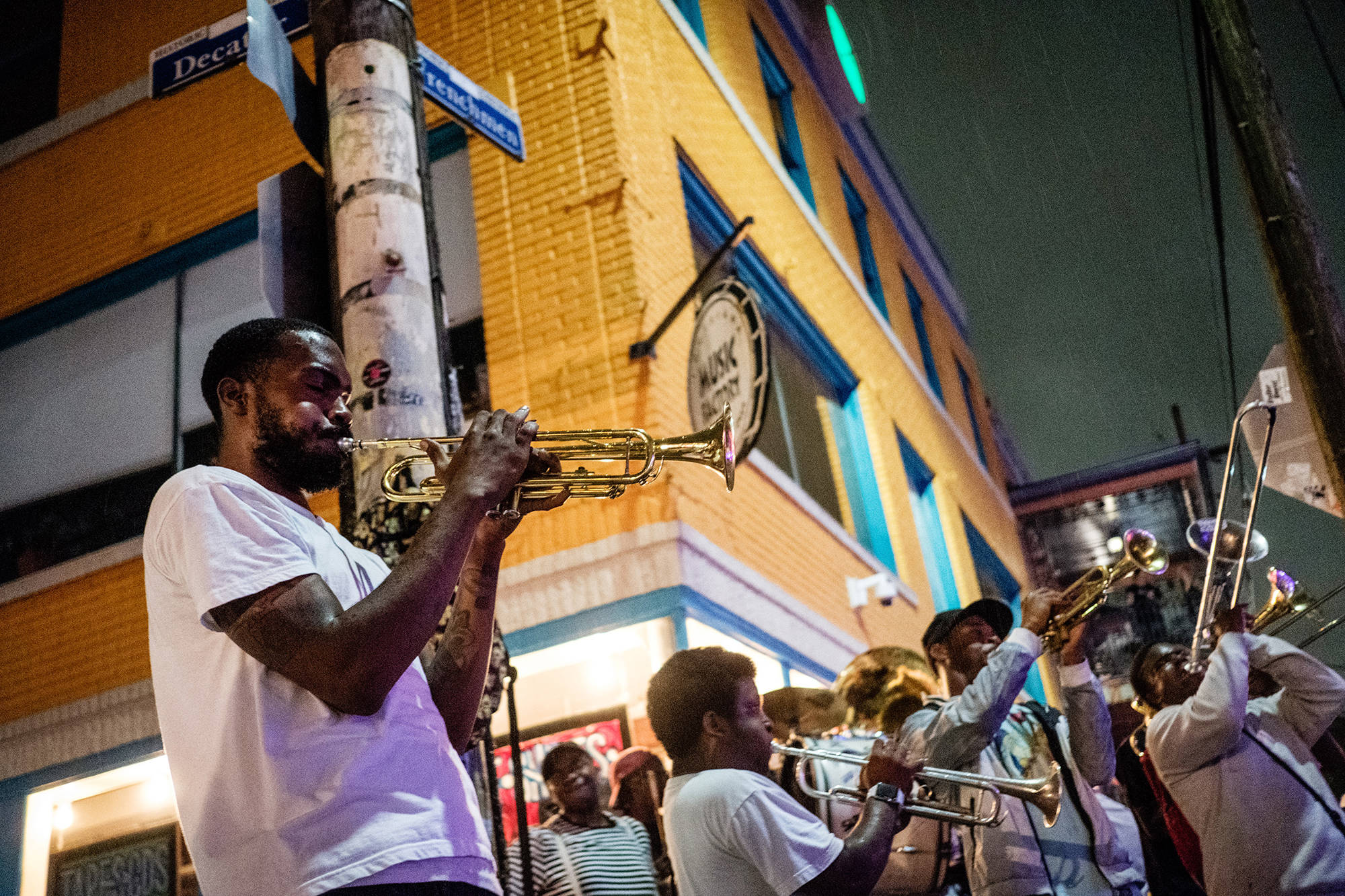 man playing the trumpet on the streets on new orleans
