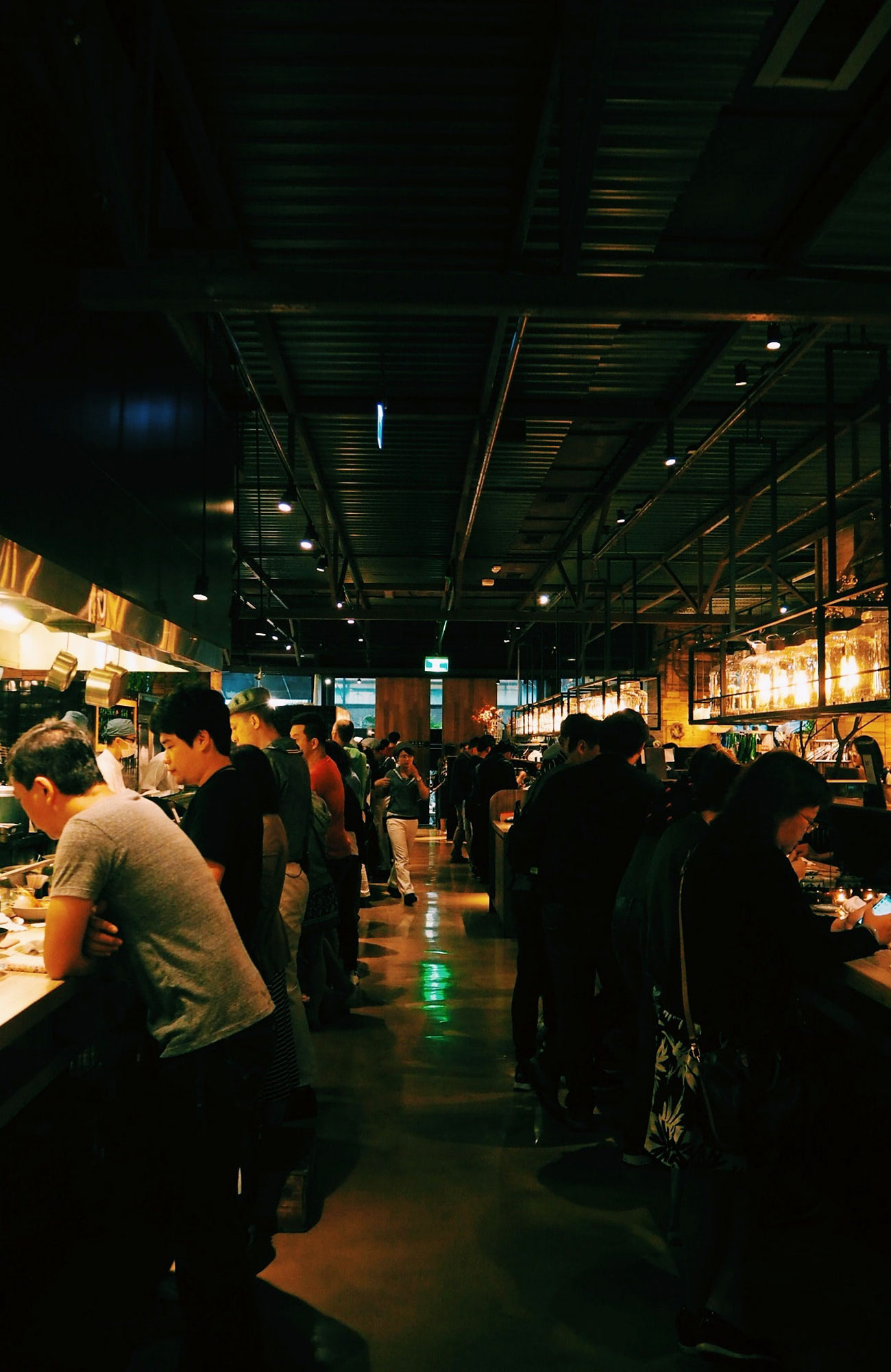 Solo Travel Beginners Guide - Crowded food hall in Asia - Blog - KILROY