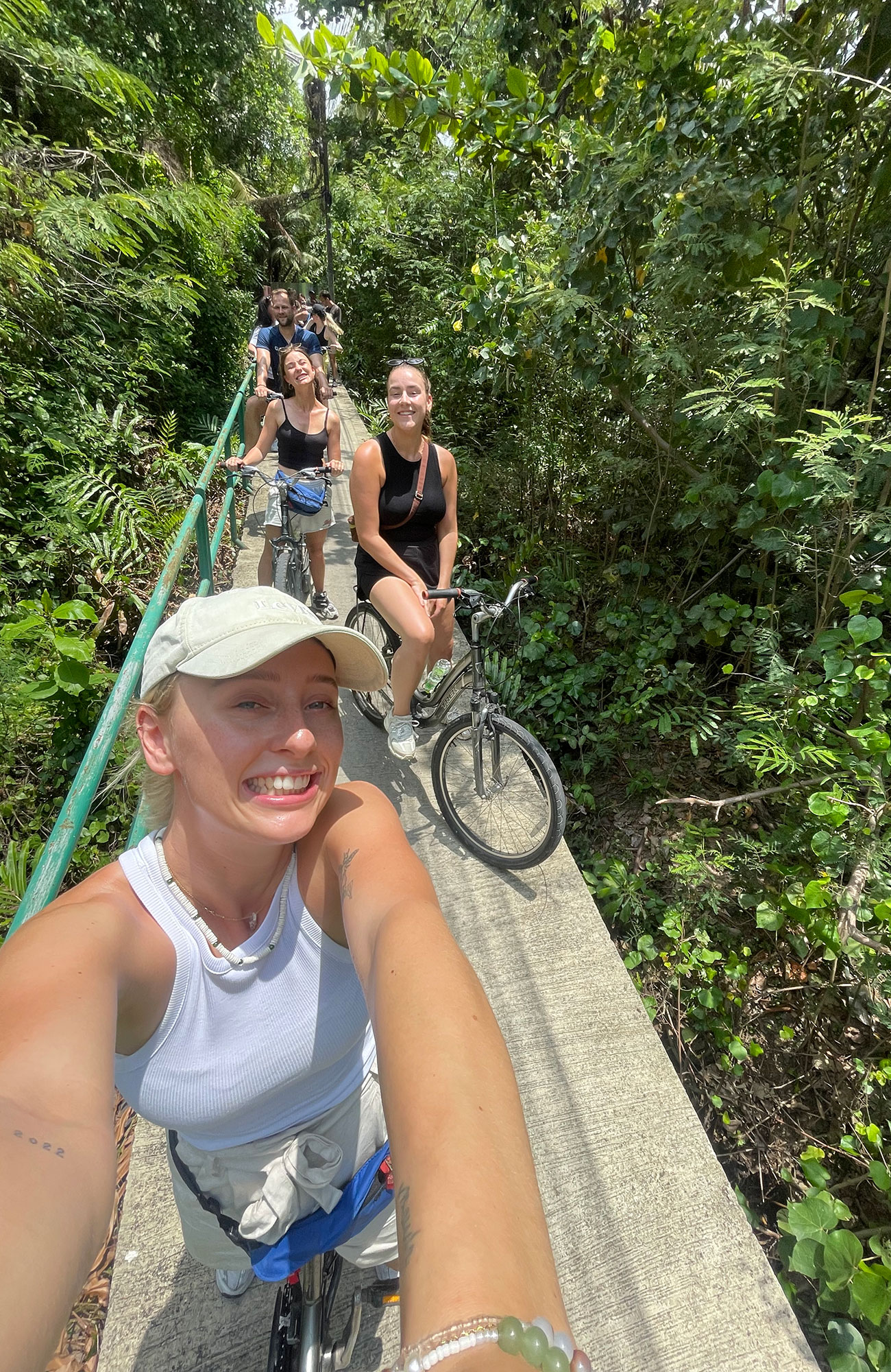 Image of a group of travellers on bikes in Thailand - KILROY